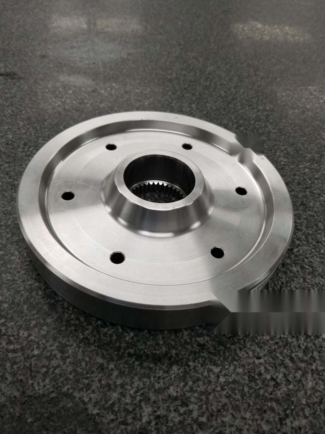 Driver flange with internal spline and bolt circle